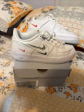 Nike White Low-Top Sneakers with Red and Gray Logos